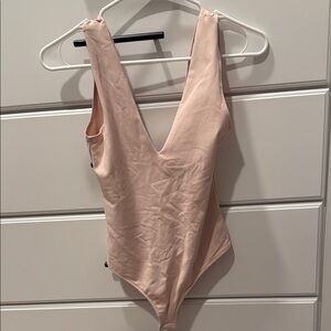 Elegant Pink Bodysuit
